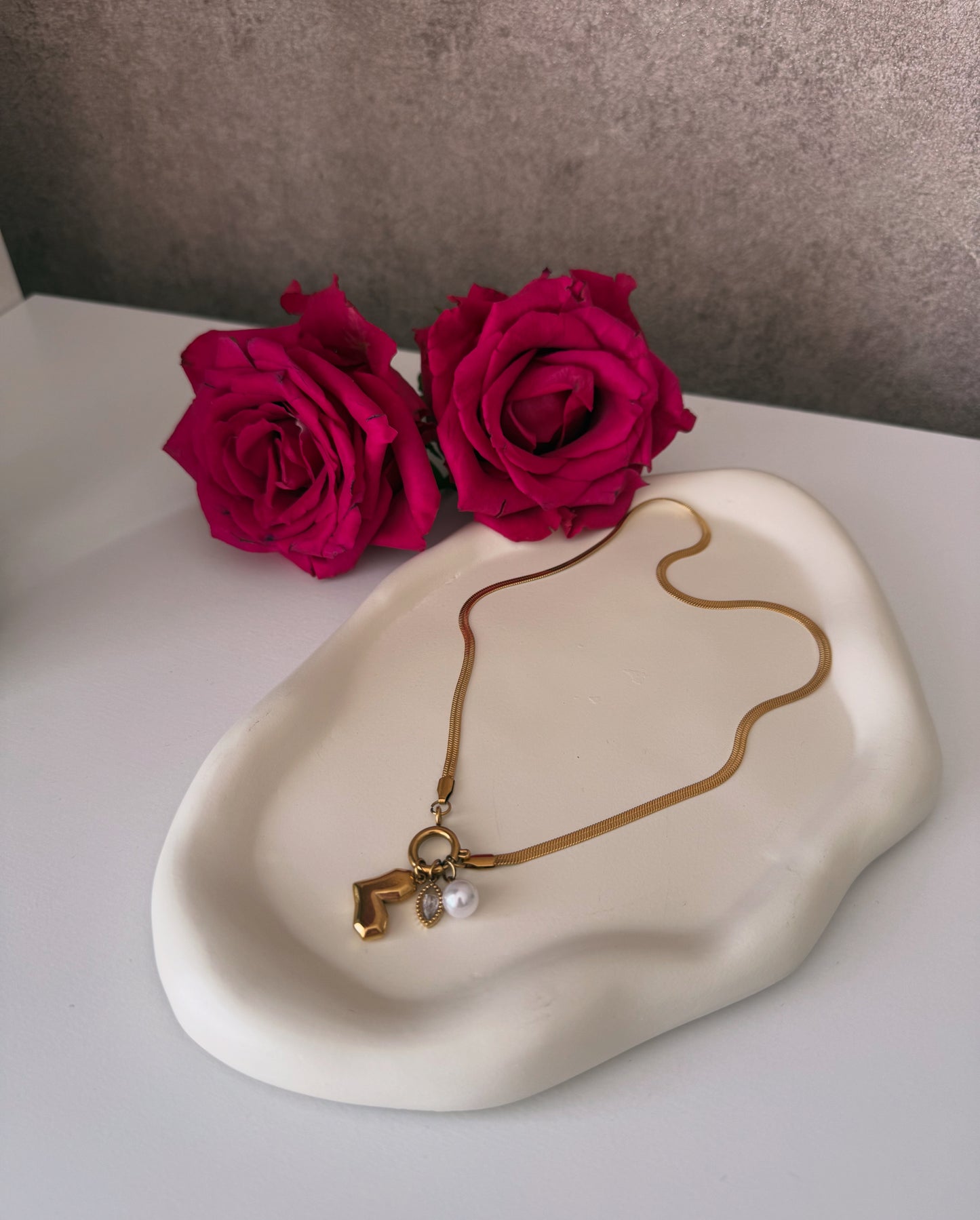 „Amor Trio“- Halskette mit Charms